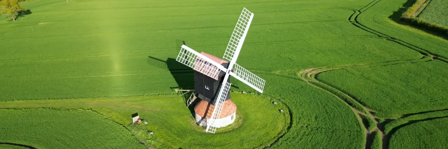 Stevington Windmill: A Tranquil Aerial Voyage in 4K
